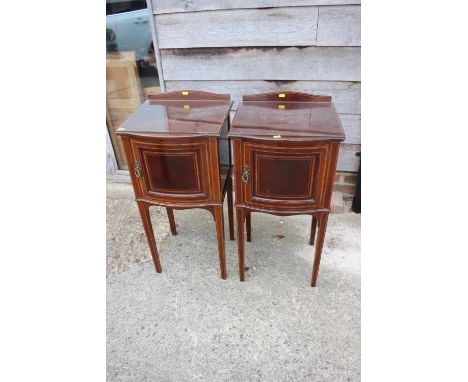 A pair of Edwardian mahogany and kingwood banded bowfront bedside cupboards, on square taper supports, 16" wide x 15" deep x 