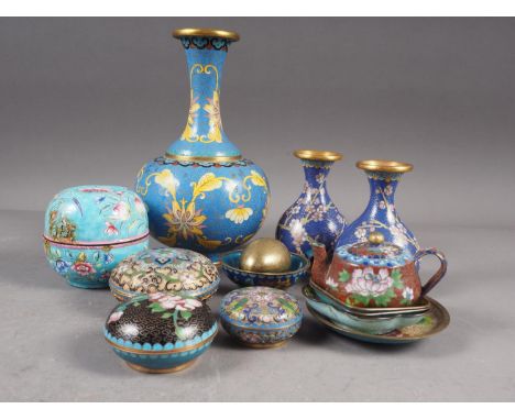 A Chinese cloisonne bulbous bottle neck vase with floral and scrolled designs on a blue ground, 8" high, a pair of similar sm