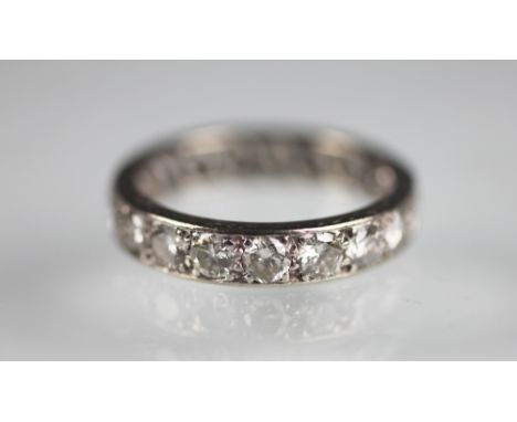 A diamond set full eternity ring, the nineteen brilliant cut diamonds (each measuring approximately 0.16ct) all set in white 