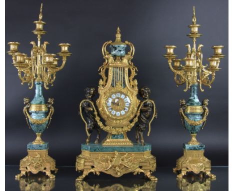 A modern Louis XV style marble and gilt brass clock garniture, with movement signed Franz Hermle and striking on a bell, the 