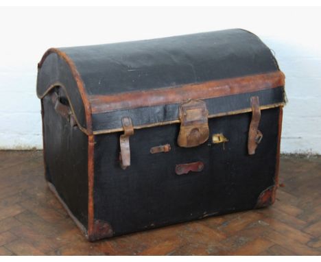 A vintage tan leather and canvas dome top trunk, c1900, 63cm H x 75cm W