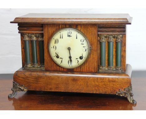 An early 20th century oak cased mantel clock, the Arabic dial signed William L. Gilbert Clock Co 27.5cm H x 43.5cm W