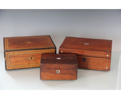 An early 19th century inlaid walnut writing slope, 30cm, a parquetry inlaid work box and a rosewood tea caddy, 20cm (3)