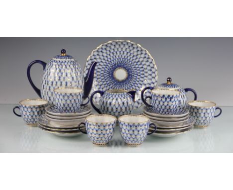 A Russian USSR twenty two piece tea service, with blue and gilt decoration (22)