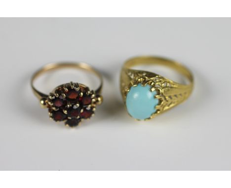 A garnet set cluster ring, the seven stone garnet cluster all set in 9ct yellow gold and a further dress ring set in yellow m