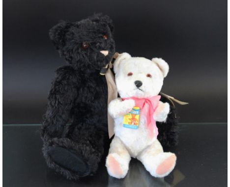 A Merrythought Alpha Farnell bear by Oliver Holmes, 50cm, with a Chiltern musical bear in white (2)