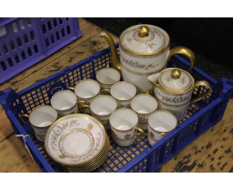 A French porcelain part coffee service, decorated with flowers against a gilt ground; six continental tea cups and saucers de
