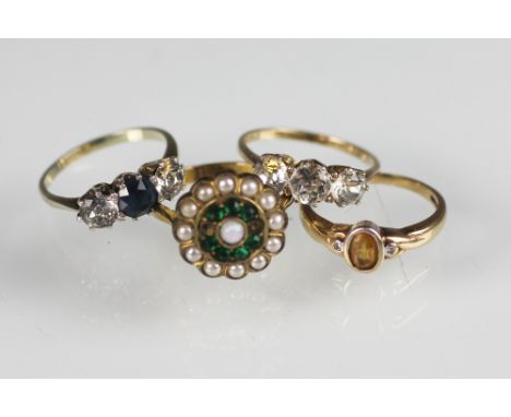 Four rings, to include; a citrine and diamond set 9ct gold ring, a circular cluster dress ring stamped '9ct', an two three st