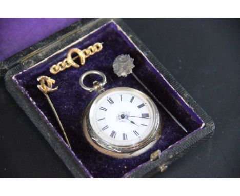 A Swiss Ladies 800 standard silver fob watch, with enamel dial, with a horse shoe brooch, a stick pin, a silver stick pin (4)