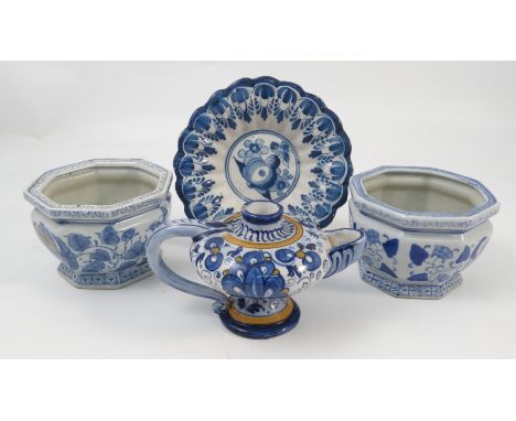 A group of 20th century Dutch delft tin glazed pottery, to include candle stands, vases, dishes models etc, together with a p