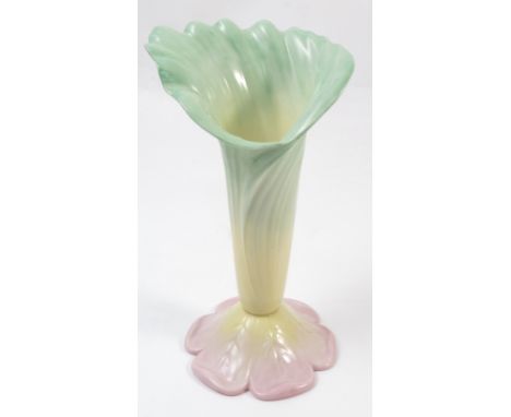 A Graingers and Co Worcester spill vase, formed as a stylized leaf with petal base, numbered G972, height 9ins 