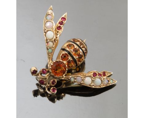 A multigem and enamel 9ct gold wasp brooch, with citrine set thorax and abdomen, ruby set eyes, antennae and wings, opals to 