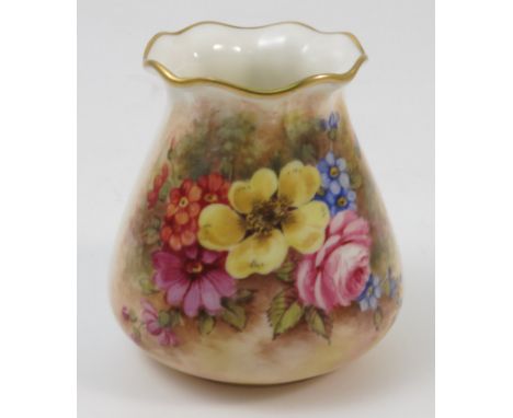 A Royal Worcester vase, of tapering cylindrical form, decorated with hand painted flowers by Freeman, shape number G957, date