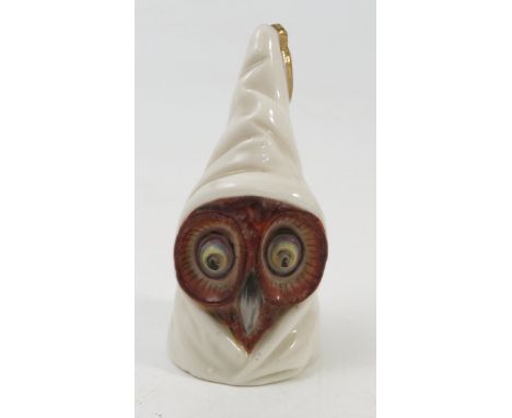 A Royal Worcester candle snuffer, modelled as the Owl, dated 1901, height 3.25ins