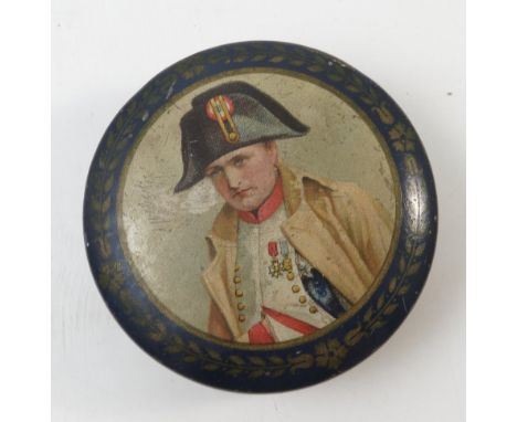 A circular tin, the pull off cover printed with a portrait of Nelson, to a blue and gilt border, with gilt N to the base, dia