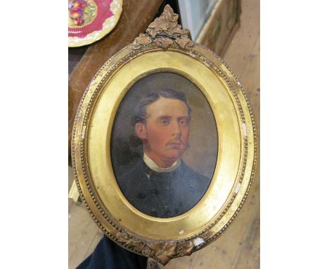 A 19th century oval oil on board, portrait of a man, maximum diameter 7.5ins