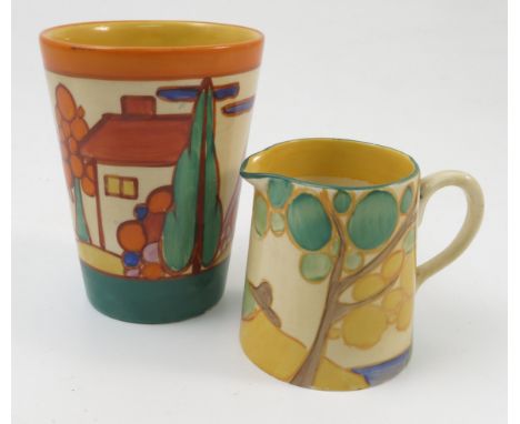 A Clarice Cliff jug, decorated in the Secret pattern, height 2.25ins, together with a Clarice Cliff beaker decorated in the T