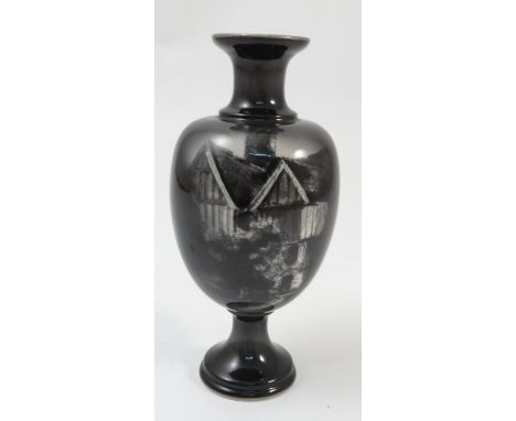 A Royal Worcester pedestal vase, decorated with a monochrome scene of the Commandery Worcester, and cottage scene to the reve