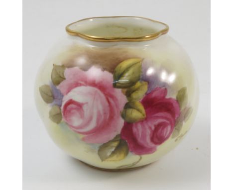 A Royal Worcester wrythen moulded vase, decorated with hand painted roses, by J Tansell, shape number G161, dated 1954, heigh