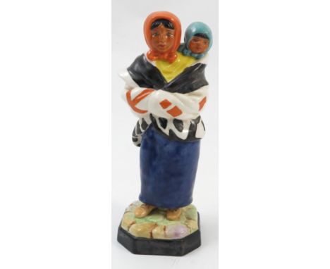 A Royal Worcester figure, Indian Squaw and Child, modelled by Gertner, model number 2910, dated 1932, height 6.25ins 