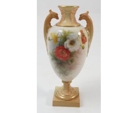 A Royal Worcester pedestal vase, decorated with hand painted poppies by Cole, to blush and gilt eagle mask handles, neck and 