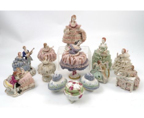 A collection of Irish Dresden porcelain, comprising ten figures, two eggs and a Noritake patch box