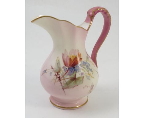 A Royal Worcester jug, decorated with floral sprays to a cream and pink ground, monogrammed ER for Edward Raby with pink and 