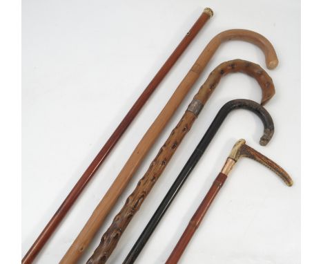 A Swaine & Adeney horn handled hunting crop with bamboo shaft and 9ct gold engraved collar, together with a W & I Sangster wa