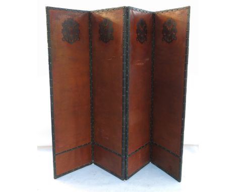 A four fold leather effect screen, each panel 70ins x 20ins 