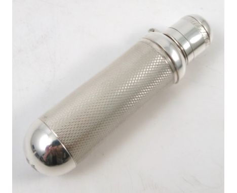 A silver hip flask, of cylindrical form, with engine turned body and hinged twist cover, Birmingham 1990, maker S J Rose & So