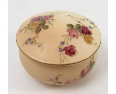 A Royal Worcester blush ivory circular box and cover, printed painted with floral sprays, dated 1912, diameter 2.75ins