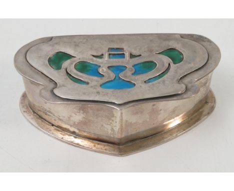 A silver and enamel Art Nouveau dressing table box, of shaped oval form, the hinged lid decorated in green and blue enamels, 