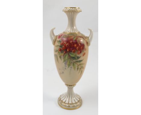 A Royal Worcester blush ivory two handled vase, decorated with rowan berries and leaves, to a white and gilt fluted neck and 