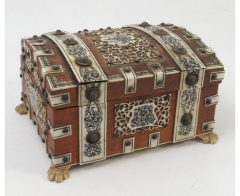 A 19th century Anglo Indian ivory, bone and sandalwood watch stand box, the exterior with domed lid decorated with engraved b