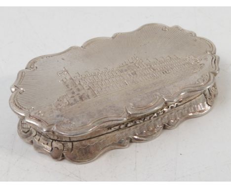 A Victorian silver vinaigrette, of shaped oval form, the top engraved with a view of Crystal Palace, the sides with lattice, 
