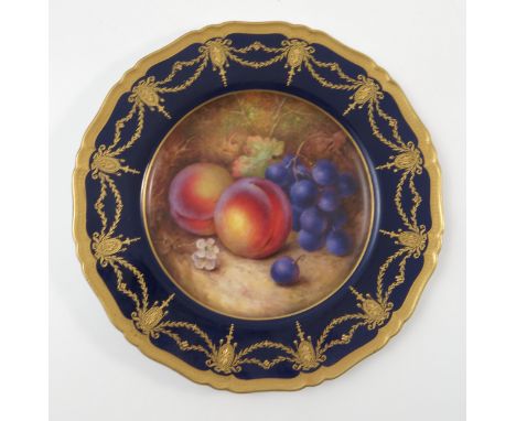 A Royal Worcester cabinet plate, hand painted with fruit to a mossy background by R Sebright, dated 1929, to a deep blue and 