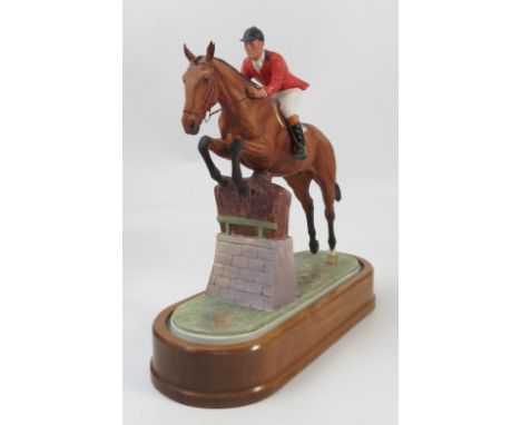 A Royal Worcester limited edition model, Foxhunter and Lt. Col. H.M. Llewellyn, with plinth and certificate 