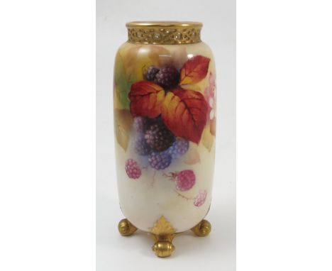 A Royal Worcester vase, decorated with hand painted autumnal berries and leaves, by K Blake, to a pierced gilded neck and rai