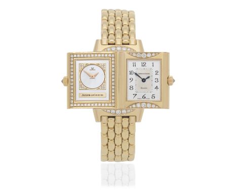 Jaeger-LeCoultre. A lady's 18K rose gold diamond set manual wind reversible bracelet watch with mother of pearl dialModel: Re