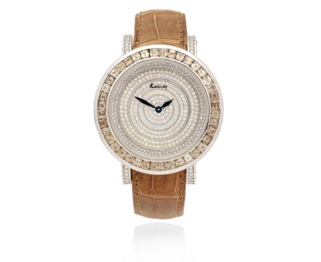 Kutchinsky. An 18K white gold diamond set quartz wristwatchModel: FontaineDate: Circa 1990Movement: Jewelled quartzDial: Pavé