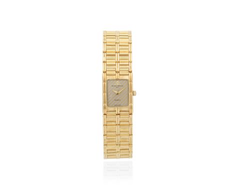 Baume &amp; Mercier. A lady's 18K gold quartz bracelet watchReference: 18501Date: Circa 1990Movement: 7-jewel Cal.BM550 quart