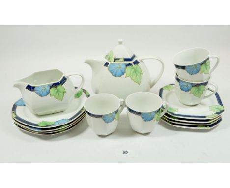 A German Art Deco style tea service comprising: teapot, sugar and milk with four cups and saucers and four tea plates 