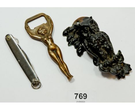 A nude bottle opener, owl door knocker and penknife 