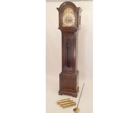 A 20th century triple chain chiming longcase clock with brass dial 