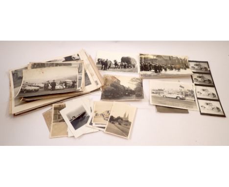 Thirty seven vintage black and white photographs showing various forms of early transport, the pictures include early racing 