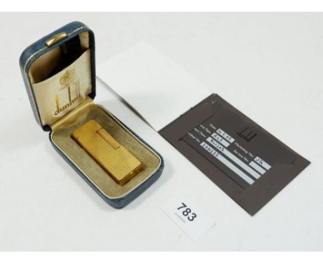A vintage gold plated Dunhill cigarette lighter with box and certificate 