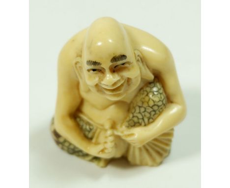 A Japanese composition netsuke 'Masatoshi' signed on the base