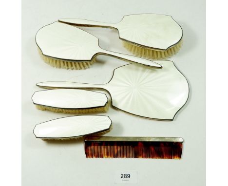 A silver and white enamel six piece dressing table set - four Birmingham 1960, two 1961 by Adie Brothers Ltd. 