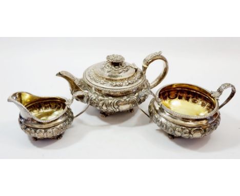 A William IV silver three piece tea service of squat form embossed floral and fruit decoration, London 1825 by Hyam Hyams, 13