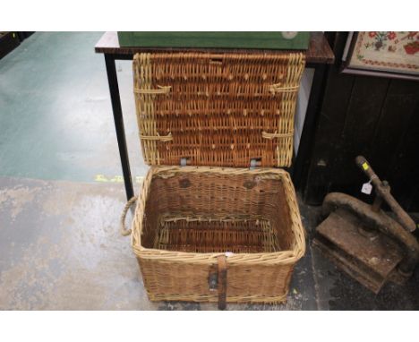 A wicker hamper basket